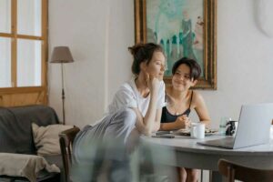 Young couple reviewing information on a laptop